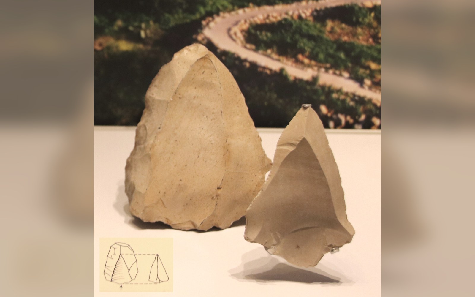 A flint core and the point struck from it, with a technical diagram
